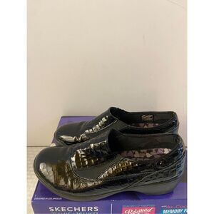 Skechers size 9 animal print black shiny sn#48661